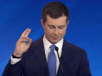 Pete Buttigieg Raises His Hand during the eighth Democrat debate