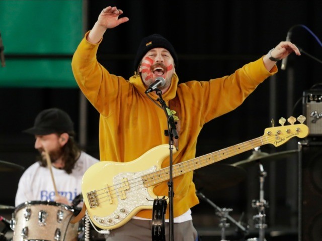 Zachary Scott Carothers performs with his rock band "Portugal. The Man" during a campaign event for Democratic presidential candidate Sen. Bernie Sanders, I-Vt., Monday, Feb. 17, 2020. (AP Photo/Ted S. Warren)
