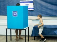 ROSH HAAYIN, ISRAEL - SEPTEMBER 17: An Israeli man and his son casts his vote on September 17, 2019 in Rosh Haayin, Israel. Israelis are heading to the polls for a second time this year after Prime Minister Benjamin Netanyahu failed to form a coalition. (Photo by Amir Levy/Getty Images)