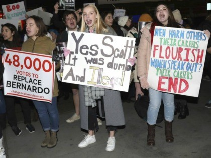 Protesters demonstrate at the Broadway opening night of "West Side Story" at The Broadway Theatre on Thursday, Feb. 20, 2020, in New York. (Photo by Greg Allen/Invision/AP)