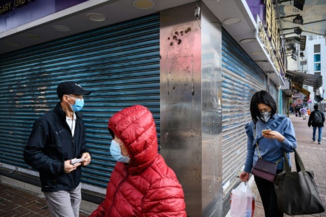 Hong Kong border towns welcome virus controls despite trade hit