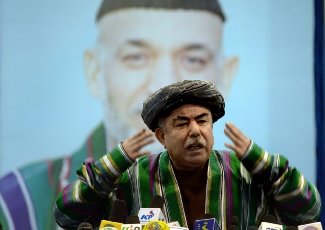 Afghan warlord denounces Ghani vote 'coup' but streets calm