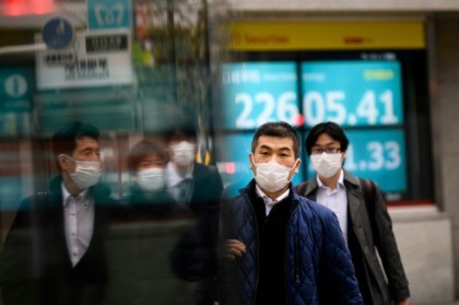 Japan reports two more virus-linked deaths, urges public events cancelled
