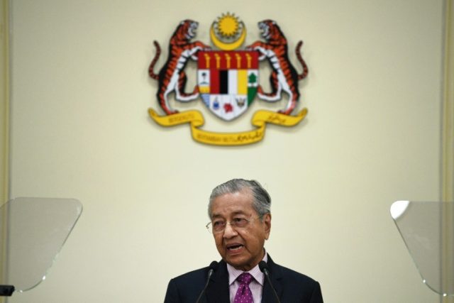 Malaysia's Mahathir out as PM as rival takes power