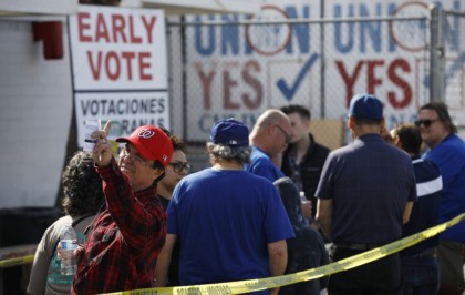 Election 2020 Nevada People wait in line to vote early at the Culinary Workers union Monday, Feb. 17, 2020, in Las Vegas. (AP Photo/John Locher) The Associated Press