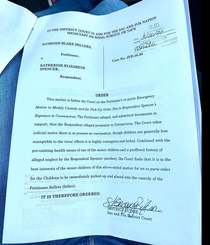 A photo of the court order Spencer says was used by police to pick up her children. (Photo: Facebook/Katie Spencer)
