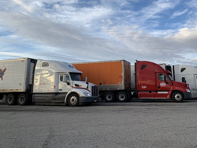 Trucks at a rest stop Digital photograph March 9, 2019 San Bernardino County, California