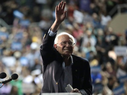 U.S. Senator Bernie Sanders waves to supporters at a campaign rally at Arizona Veterans Memorial Coliseum in Phoenix, Arizona.