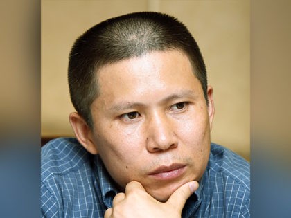 FILE - In this July 17, 2009 file photo, legal scholar Xu Zhiyong, is seen at a meeting in