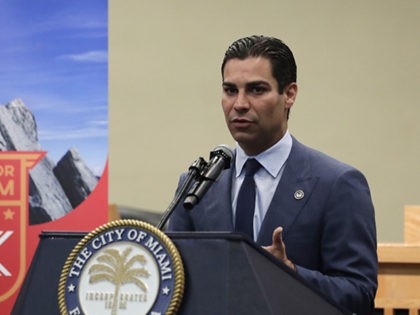 Miami Mayor Francis Suarez speaks during a news conference regarding local efforts to support the Venezuelan democracy movement, at Miami City Hall, Monday, July 22, 2019, in Miami. The City of Miami will host a 5K run July 28 to raise money for the movement. (AP Photo/Lynne Sladky)