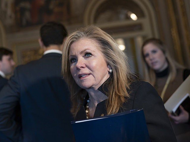 Sen. Marsha Blackburn, R-Tenn., meets with other allies of President Donald Trump during a break in his impeachment trial, at the Capitol in Washington, Wednesday, Jan. 29, 2020. (AP Photo/J. Scott Applewhite)