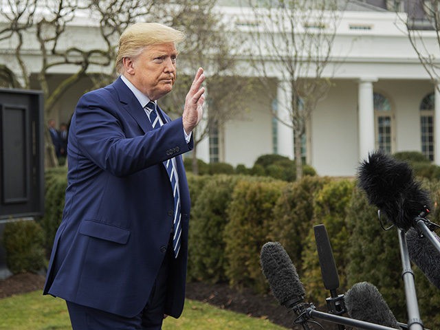 President Donald Trump waves after speaking to the members of the media on the South Lawn of the White House, Tuesday, March 3, 2020, in Washington as he leaves to visit the National Institutes of Health's Vaccine Research Center in Bethesda, Md. (AP Photo/Manuel Balce Ceneta)