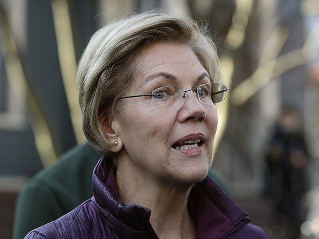 Sen. Elizabeth Warren, D-Mass., speaks to the media outside her home Thursday, March 5, 2020, in Cambridge, Mass., after she dropped out of the Democratic presidential race. (AP Photo/Steven Senne)