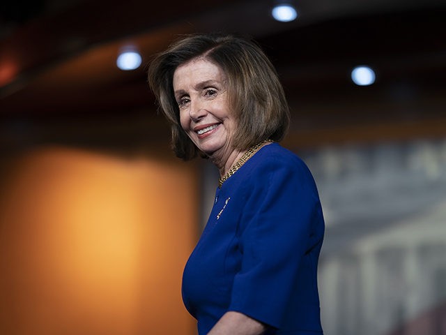 House Speaker Nancy Pelosi, D-Calif., leaves after speaking at a news conference on Capito