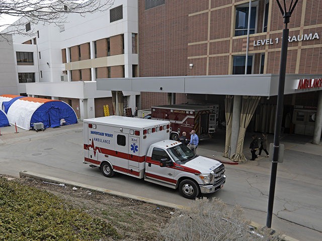 Negative pressure tents, left, are shown outside the University of Utah's hospital, Monday