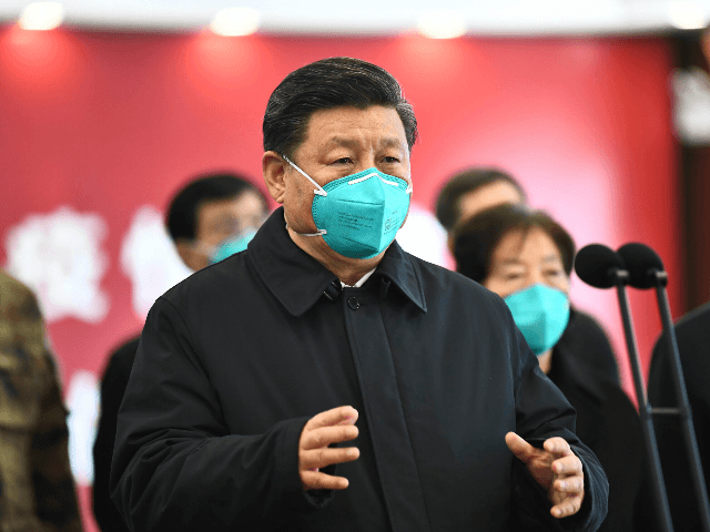 In this photo released by China's Xinhua News Agency, Chinese President Xi Jinping talks by video with patients and medical workers at the Huoshenshan Hospital in Wuhan in central China's Hubei Province, Tuesday, March 10, 2020. China's president visited the center of the global virus outbreak Tuesday as Italy began …
