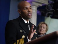 Surgeon General Jerome Adams speaks during press briefing with the coronavirus task force, at the White House, Thursday, March 19, 2020, in Washington. (AP Photo/Evan Vucci)