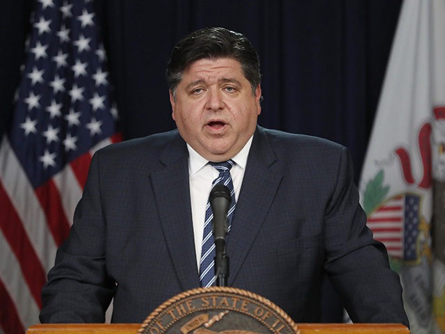 Illinois Gov. J.B. Pritzker announces that three more people have died in the state from from Covid-19 virus, two Illinois residents and one woman visiting from Florida, during a news conference Thursday, March 19, 2020, in Chicago. (AP Photo/Charles Rex Arbogast)