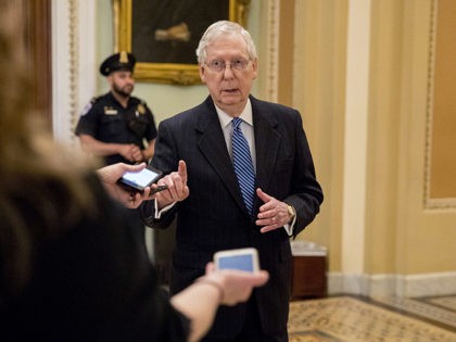 Senate Majority Leader Mitch McConnell of Ky. speaks to reporters outside the Senate chamb