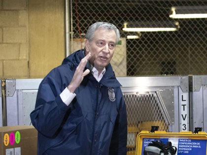 New York City Mayor Bill de Blasio, left, discusses the arrival of a shipment of 400 venti