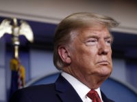 President Donald Trump listens during a briefing about the coronavirus in the James Brady Briefing Room, Wednesday, March 25, 2020, in Washington. (AP Photo/Alex Brandon)