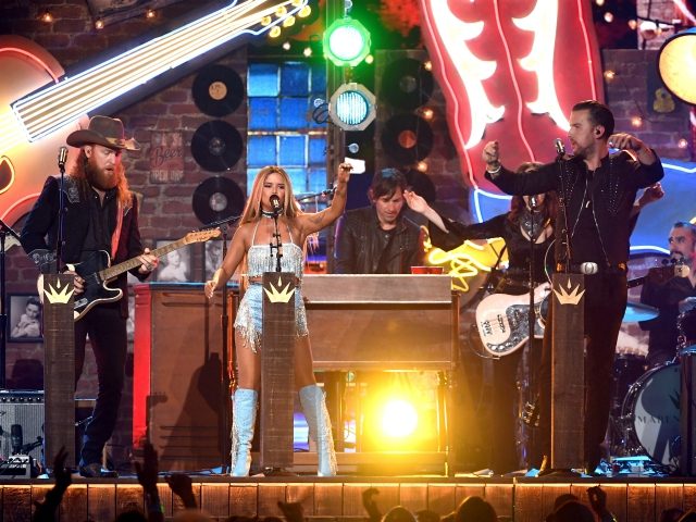 LAS VEGAS, NEVADA - APRIL 07: Maren Morris (C) performs with John Osborne (L) and T.J. Osb