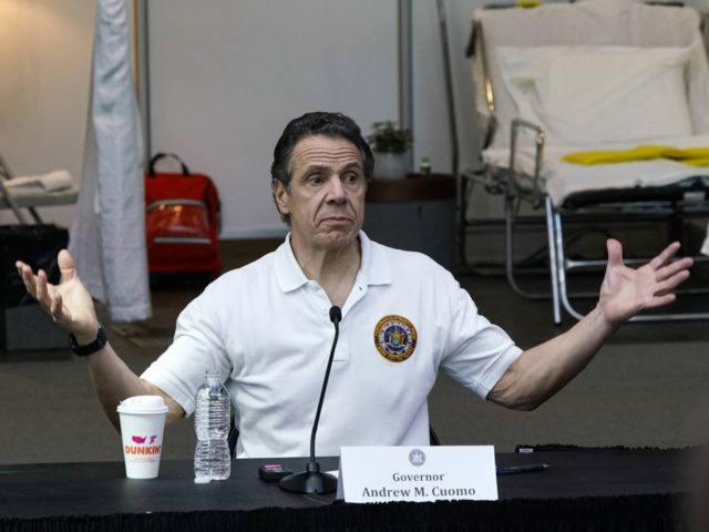 NEW YORK, NY - MARCH 27: New York Gov Andrew Cuomo gives a daily coronavirus press conference in front of media and National Guard members at the Jacob K. Javits Convention Center, which is being turned into a hospital to help fight coronavirus cases on March 27, 2020 in New …