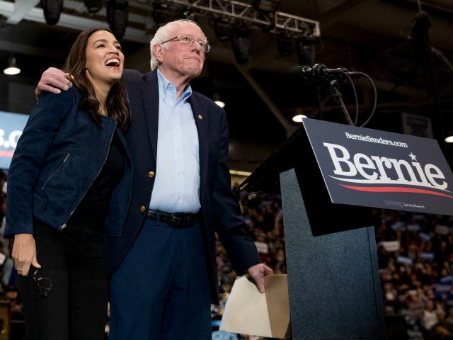 Democratic presidential candidate Sen. Bernie Sanders, I-Vt., accompanied by Rep. Alexandr