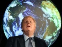 Britain's Prime Minister Boris Johnson reacts during an event to launch the United Nations' Climate Change conference, COP26, in central London on February 4, 2020. - Britain will bring forward a ban on sales of new petrol and diesel vehicles to 2035, including hybrids, Prime Minister Boris Johnson was to …
