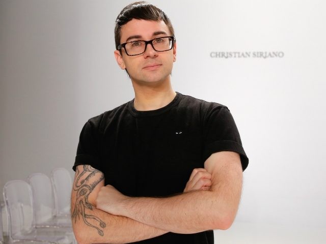 NEW YORK, NY - APRIL 18: Designer Christian Siriano poses on the runway before his Christi