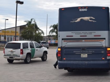 A Rio Grande Valley Sector Border Patrol agent conducts a random immigration inspection on a Greyhound Bus. (File Photo: Bob Price/Breitbart Texas)