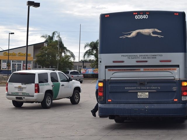A Rio Grande Valley Sector Border Patrol agent conducts a random immigration inspection on a Greyhound Bus. (File Photo: Bob Price/Breitbart Texas)