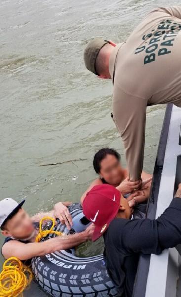 Del Rio Sector Border Patrol agents rescue a Honduran family attempting to illegally cross the Rio Grande. (Photo: U.S. Border Patrol/Del Rio Sector)