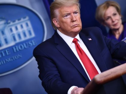 US President Donald Trump listens to a question during the daily briefing on the novel coronavirus, COVID-19, at the White House on March 18, 2020, in Washington, DC. - Trump ordered the suspension of evictions and mortgage foreclosures for six weeks as part of the government effort to ease the …