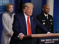 Flanked by members of the Coronavirus Task Force, U.S. President Donald Trump speaks during a news briefing on the latest development of the coronavirus outbreak in the U.S. in the James Brady Press Briefing Room at the White House March 19, 2020 in Washington, DC. With Americans testing positive by …