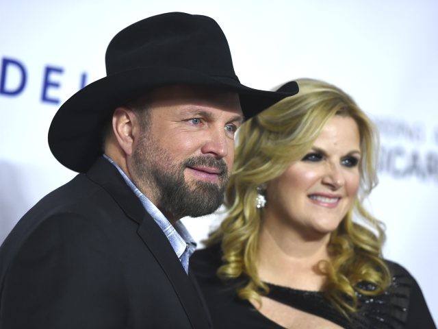 Garth Brooks, left, and Trisha Yearwood arrive at MusiCares Person of the Year honoring Do