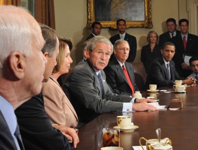 George Bush with McCain and Obama (Tim Sloan / AFP / Getty)