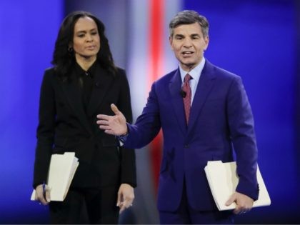ABC Chief Anchor George Stephanopoulos, right, and ABC News Live Anchor Linsey Davis, left, address members of the audience Friday, Feb. 7, 2020, before the start of a Democratic presidential primary debate hosted by ABC News, Apple News, and WMUR-TV at Saint Anselm College in Manchester, N.H. (AP Photo/Charles Krupa)