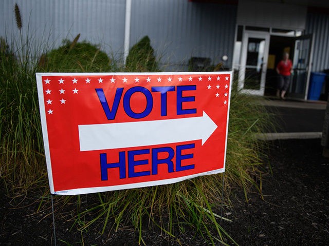 NEWARK, OH - AUGUST 07: Voters head to the polls at the Licking County Family YMCA to vote