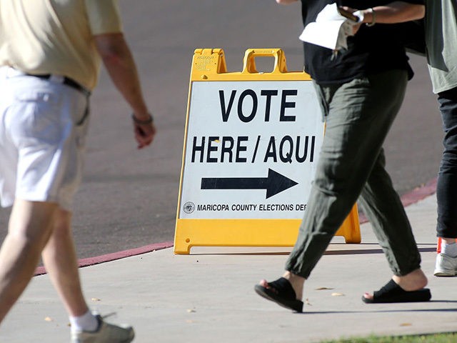PHOENIX, AZ - AUGUST 28: Arizona voters make their way to a polling place to cast their vote in the state's Primary on August 28, 2018 in Phoenix, Arizona. The state of Arizona has Senate primary day elections as voters decide between former State Senator Kelli Ward, Arizona Representative Martha …