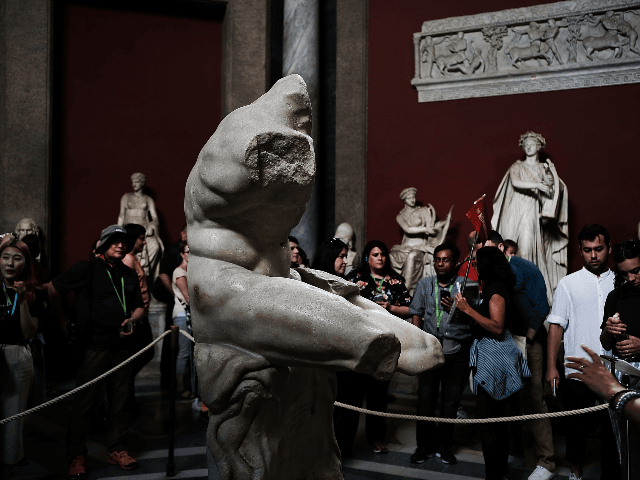 People walk through the Vatican Museums on September 01, 2018 in Vatican City, Vatican. Te