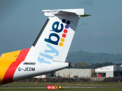 EXETER, ENGLAND - OCTOBER 18: A aircraft operated by the airline Flybe, taxis down the runway at Exeter Airport near Exeter on October 18, 2018 in Devon, England. The value of shares in the Exeter-based airline Flybe, have fallen dramatically recently after the company issued another profit warning, blaming poor …