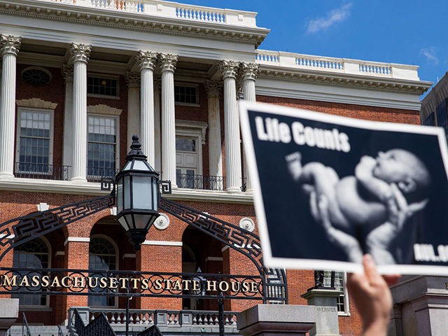 BOSTON, MA - JUNE 17: Members of Massachusetts Citizens for Life hold a rally outside the Massachusetts Statehouse on June 17, 2019 in Boston, Massachusetts. Opposing activists were rallying in advance of consideration by lawmakers of measures aimed at loosening restrictions on abortion, including removing criminal penalties for those performed …