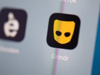 This illustration picture taken on July 24, 2019 in Paris shows the logo of the US social networking application Grindr on the screen of a tablet. (Photo by Martin BUREAU / AFP) (Photo credit should read MARTIN BUREAU/AFP via Getty Images)