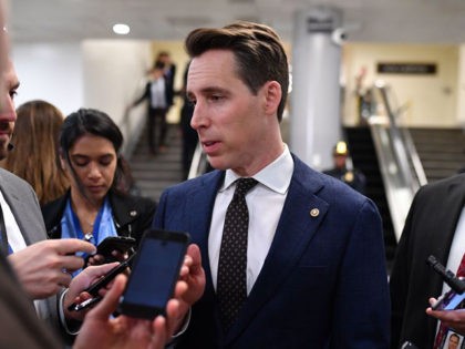 US Senator Josh Hawley, Republican of Missouri, speaks to the press during a recess in the impeachment trial at the US Capitol on January 24, 2020 in Washington, DC. - Democratic prosecutors were expected to wrap up their case against US President Donald Trump in his impeachment trial Friday, hoping …