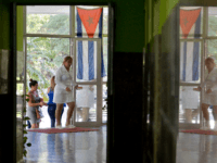 A nurse arrives at the Plaza de la Revolución Polyclinic in Havana, on February 12, 2020. (Photo by YAMIL LAGE / AFP) (Photo by YAMIL LAGE/AFP via Getty Images)