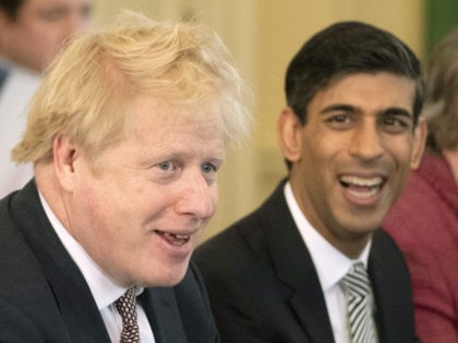 LONDON, ENGLAND - FEBRUARY 14: British Prime Minister Boris Johnson speaks during his first Cabinet meeting flanked by his new Chancellor of the Exchequer Rishi Sunak, after a reshuffle the day before, inside 10 Downing Street, at Downing Street on February 14, 2020 in London, England. The Prime Minister reshuffled …