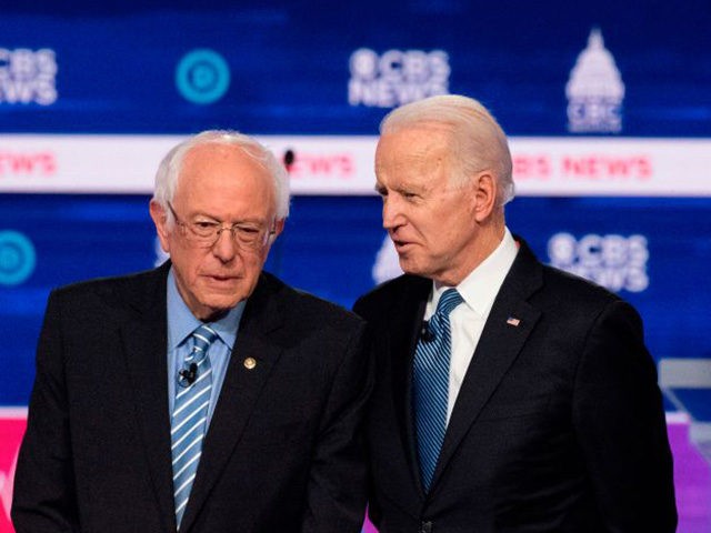 Democratic presidential hopefuls Vermont Senator Bernie Sanders (L) and Former Vice Presid