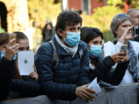 Faithfuls wearing protective face masks attend at the Ash Wednesday mass lead by Pope Francis during which opens Lent, the forty-day period of abstinence and deprivation for Christians before Holy Week and Easter, on February 26, 2020, at the Santa Sabina church in Rome. (Photo by Alberto PIZZOLI / AFP) …