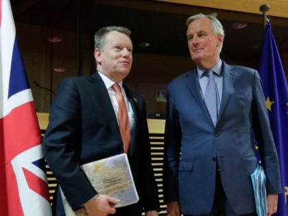 European Union chief Brexit negotiator Michel Barnier (R) and the British Prime Minister's Europe adviser David Frost pose for a photograph at start of the first round of post-Brexit trade deal talks between the EU and the United Kingdom, in Brussels on March 2, 2020. (Photo by Olivier HOSLET / …